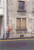 history06 > Wasserbillig, Luxembourg 

Bill Roshek; 87th Division Reconnaisance....or "Recon" who fought at 
Wasserbillig, Luxembourg inspects the bullet markings on the school wall.

Bill Roshek  was engaged with his "Recon" group at the liberation of Wasserbillig, Luxembourg on Jan.23,1945

Picture taken on VBOB Galaxy Tour
October - 1994.

For info on 87th Infantry Division Association:
http://www.87thinfantrydivision.com