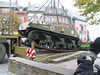 history06 > SHERMAN TANK - McAULIFFE SQUARE - BASTOGNE, BELGIUM
November 6, 2006

Here are some pictures taken by Guy Peremans, of COBRA and CRIBA, showing the main phases of the picking up of the Sherman Tank from the McAuliffe Square in Bastogne, Belgium, for restoration on
Tuesday, November 6, 2006.

The tank will stay in the Rocourt Arsenal until next April or May and will be cleaned, repainted and refitted. 
All the inhabitants of Bastogne are already waiting for its come back.

Submitted by:
Roger Marquet
Honorary Lifetime Member of the 11th Armd Division Association.

Centre Etude Battaile Ardennes
( C.E.B.A. )
The Center for the Study of the Battle of the Ardennes is the study group in Luxembourg.

A similar group exists in Belgium.....
Centre pour Research et Information de Battaile Ardennes.. ( C.R.I.B.A )
The Center for Research and Information of the Battle of the Ardennes.

Voici, photographiées par Guy Péremans, vice président COBRA et membre du CRIBA, les phases principales de l'enlêvement du char de la Place McAuliffe à Bastogne, le lundi 6 novembre 2006. Le char a été emmené à l'Arsenal de Rocourt (près de Liège) où il sera lavé, décapé, poncé, sablé et repeint. Il sera aussi remis en état (roues, chenilles, tourelle, mitrailleuse,...). Son retour est prévu pour avril ou mai 2007. Les Bastognards l'attendent déjà avec impatience.

For info on 87th Infantry Division Association:
http://www.87thinfantrydivision.com