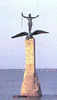 St. Nazaire, France Memorial

A.E.F. Memorial in St. Nazaire Harbor.
With outstreached arms and a sword in his hand, 
a doughboy stands on the back of a giant eagle that has just landed. 

Dedicated to the US Army Expeditionary Forces 
of World War One, at St. Nazaire, France, 
their landing place April, 1917. 

It was designed by Gertrude Vanderbilt Whitney, Sculptress, 
with Studio in New York City. 

My father, Florence J. McAuliffe was a sculptor in her employ
and worked on creating this monument. 

The monument was destroyed by the Nazis during their occupation of France in 1940.

St. Nazaire became an important Nazi Submarine Base in WW-II....
A British raid on the base was a complete disaster and failure in 1942. 

I retain to this day the cast iron eagle's claw which was used as a model for the monument.

As with all galleries of history06 - we welcome comments/thoughts/memories.
Just click on "comments" at lower left of page. 


submitted by:
John McAuliffe
87th Infantry Division
M-347

Update - April - 2007:
After placing the picture of the St. Nazaire Monument in this gallery, 
Mr. John McAuliffe received word from his Belgian friend, 
Stevenot Gilbert, informing him that in fact, 
the monument was rebuilt ~1989!

Mr. Gilbert also gives this interesting web site about the monument and additional pictures:

http://www.linternaute.com/nantes/magazine/sorties/photo/saintnazaire/3.shtml
