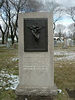 history06 > Per Mr. John McAuliffe:

This crucifixion plaque was sculptured by my Dad, Florence McAuliffe for his father's gravestone...Timothy J. McAuliffe (also a sculptor).

After 60 years it had gathered a deep stained green patina.....

I spent hours removing it and applying a bronze laquer stain and a sealant spray over that.

Here is the full size monument....The granite is Milford Pink.....
from quarry in Milford, MA.